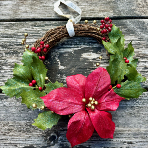 Holly and poinsettia crepe paper Christmas wreath