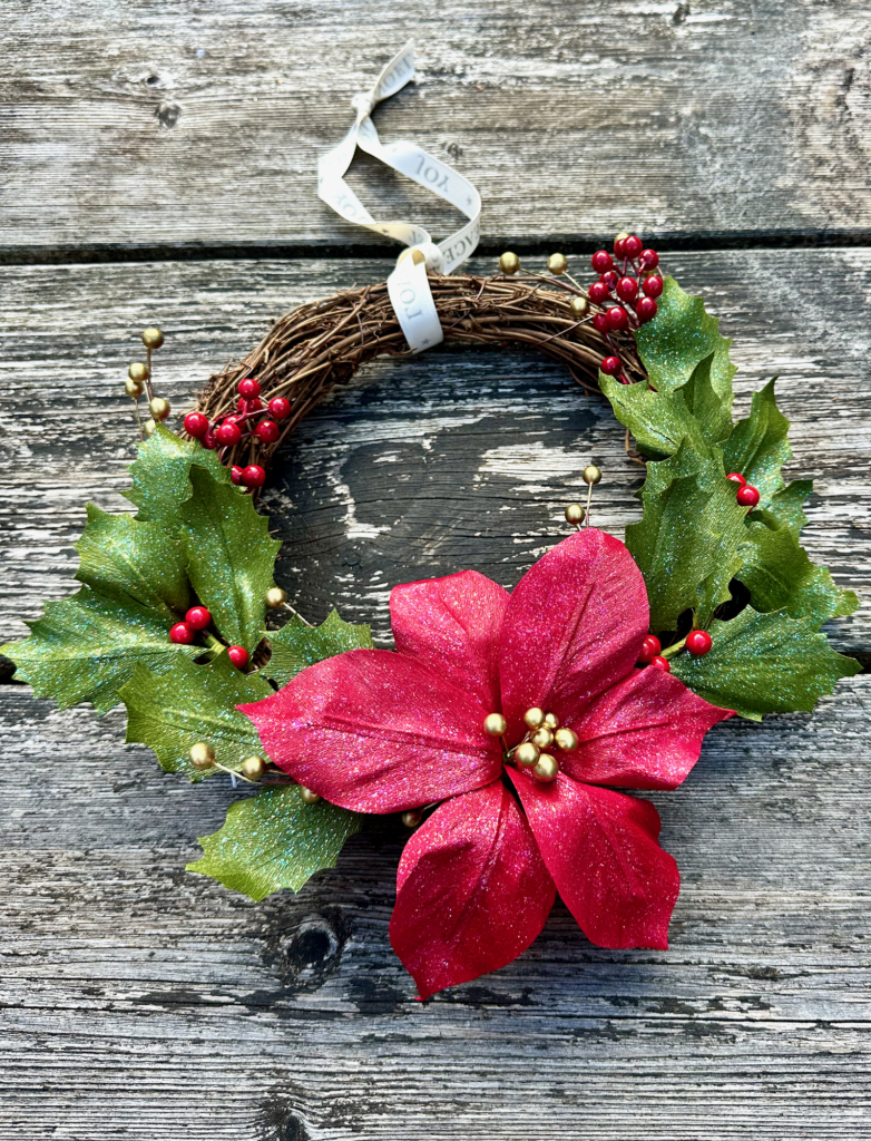 Holly and poinsettia crepe paper Christmas wreath